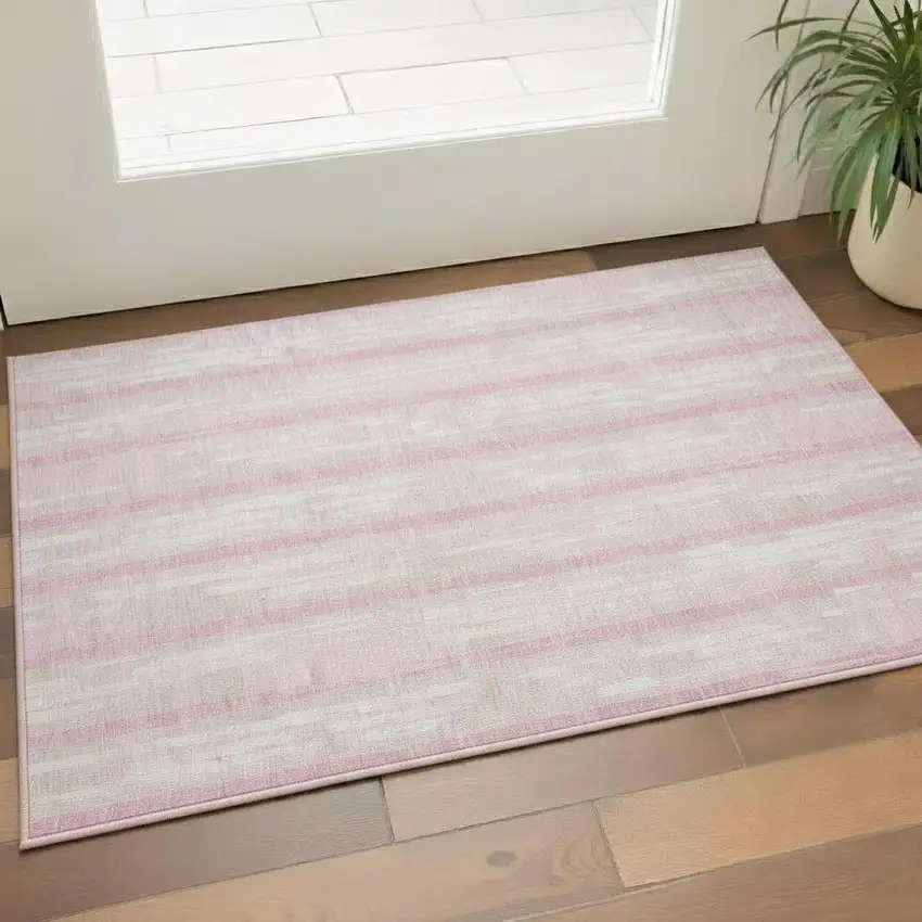 Pink And Ivory Striped Washable Area Rug With UV Protection Photo 1