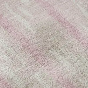 Photo of Pink And Ivory Striped Washable Area Rug With UV Protection