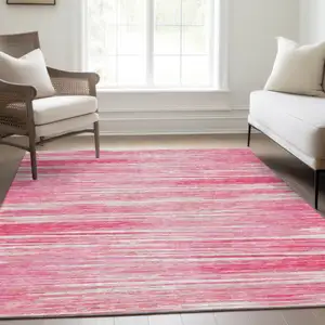Photo of Pink And Ivory Striped Washable Area Rug With UV Protection