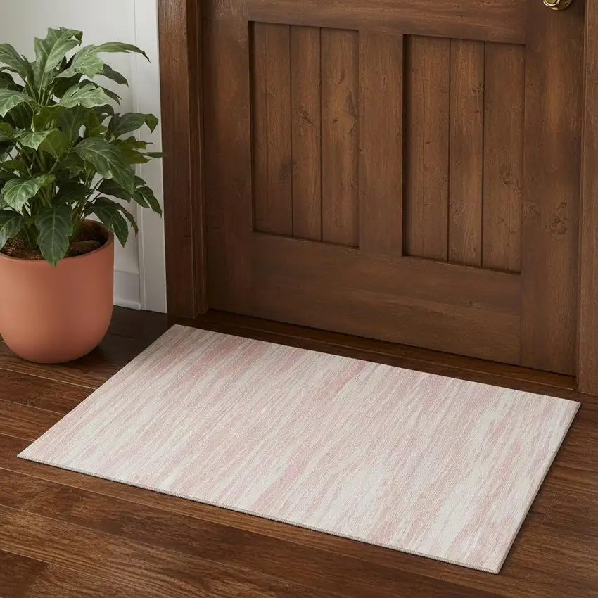 Pink And Ivory Striped Washable Area Rug With UV Protection Photo 1