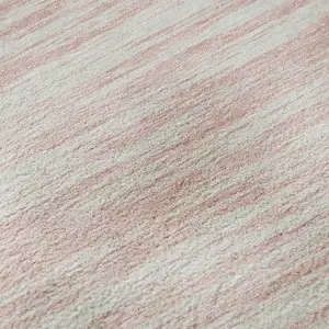 Photo of Pink And Ivory Striped Washable Area Rug With UV Protection