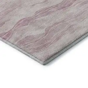 Photo of Pink And Ivory Striped Washable Area Rug With UV Protection