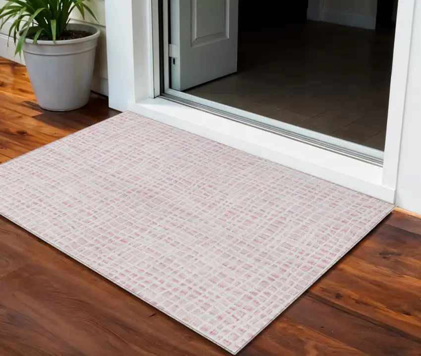 Pink And Ivory Striped Washable Indoor Outdoor Area Rug Photo 1