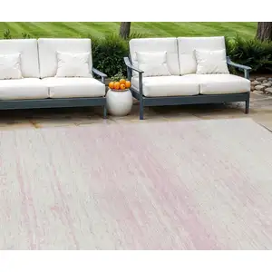 Photo of Pink And Ivory Striped Washable Indoor Outdoor Area Rug