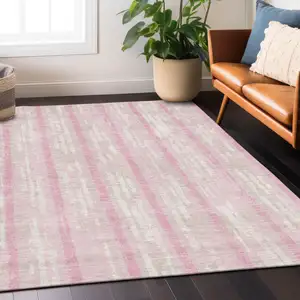 Photo of Pink And Ivory Striped Washable Indoor Outdoor Area Rug