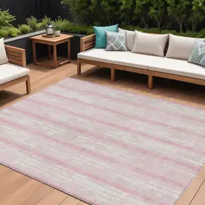 Photo of Pink And Ivory Striped Washable Indoor Outdoor Area Rug