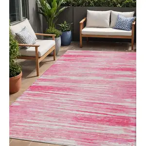 Photo of Pink And Ivory Striped Washable Indoor Outdoor Area Rug