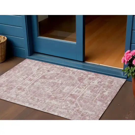 Pink And Ivory Tribal Washable Indoor Outdoor Area Rug Photo 1