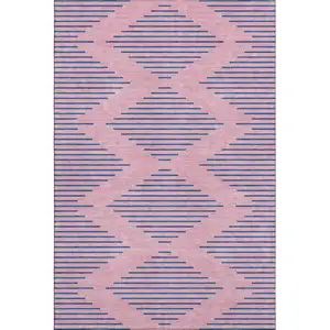 Photo of Pink And Navy Blue Geometric Washable Area Rug With UV Protection