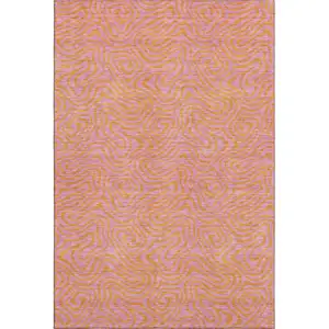 Photo of Pink And Orange Abstract Washable Area Rug With UV Protection
