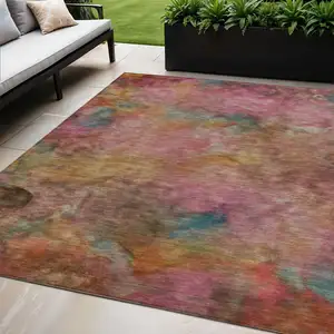 Photo of Pink And Orange Abstract Washable Indoor Outdoor Area Rug