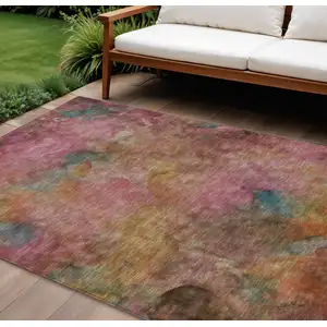Photo of Pink And Orange Abstract Washable Indoor Outdoor Area Rug