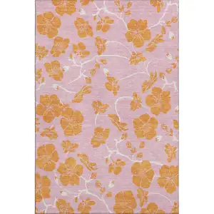 Photo of Pink And Orange Floral Washable Area Rug With UV Protection
