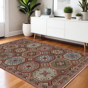 Photo of Pink And Red Medallion Area Rug With Fringe