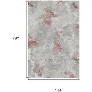 Photo of Pink And White Abstract Area Rug
