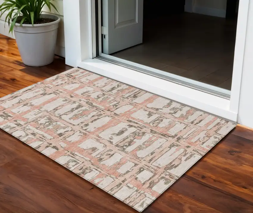 Pink Beige And Taupe Striped Washable Indoor Outdoor Area Rug Photo 1