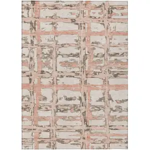 Photo of Pink Beige And Taupe Striped Washable Indoor Outdoor Area Rug