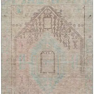 Photo of Pink Beige And Teal Tribal Washable Area Rug With UV Protection