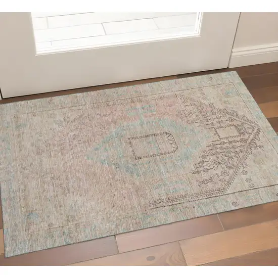 Pink Beige And Teal Tribal Washable Area Rug With UV Protection Photo 1