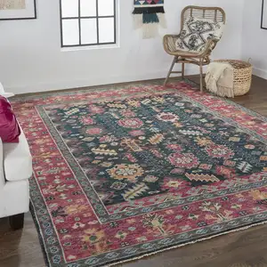 Photo of Pink Blue And Orange Wool Floral Hand Knotted Distressed Stain Resistant Area Rug With Fringe