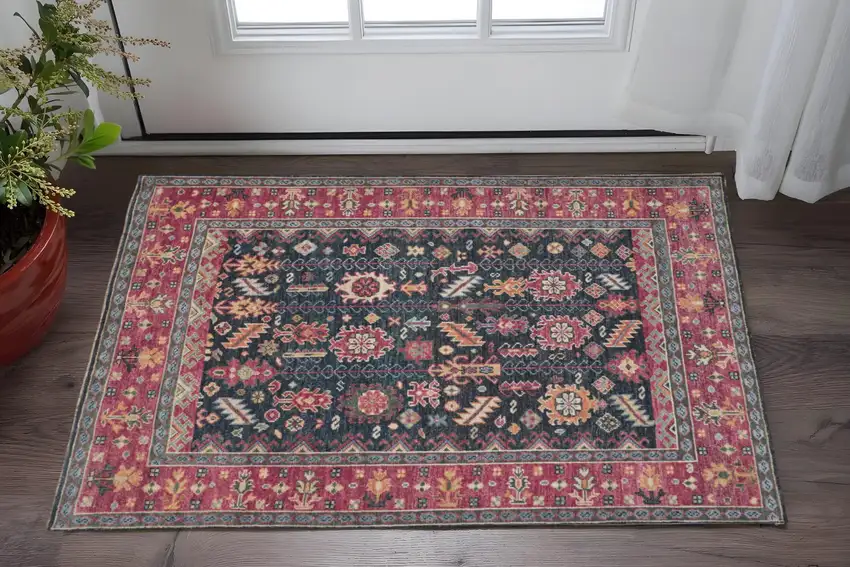 Pink Blue And Orange Wool Floral Hand Knotted Distressed Stain Resistant Area Rug With Fringe Photo 1