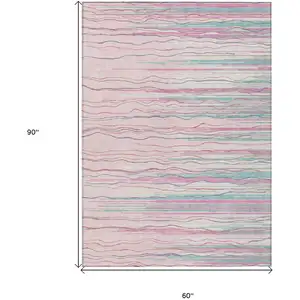 Photo of Pink Blue And Purple Striped Washable Indoor Outdoor Area Rug