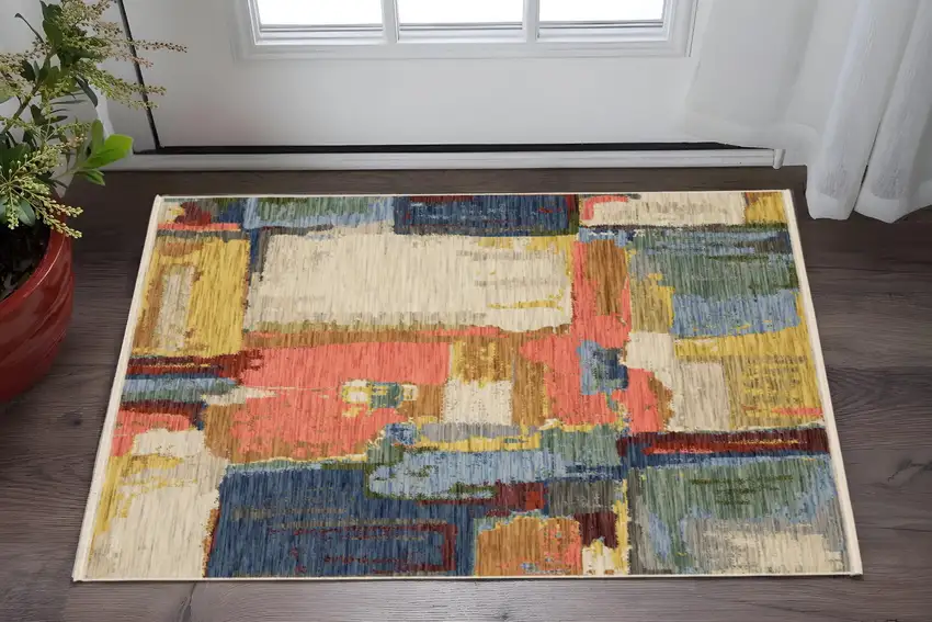 Pink Blue And Yellow Abstract Area Rug With Fringe Photo 1