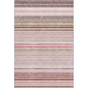 Photo of Pink Burgundy And Ivory Striped Washable Area Rug With UV Protection