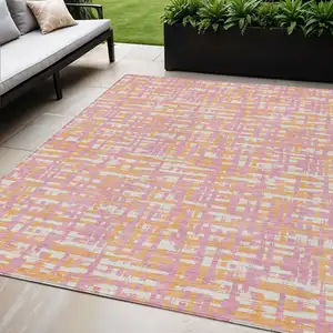 Photo of Pink Copper And Beige Abstract Washable Indoor Outdoor Area Rug
