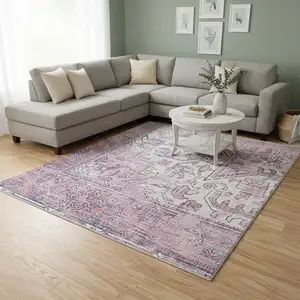 Photo of Pink Floral Distressed Area Rug