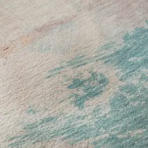 Photo of Pink Gold And Teal Abstract Washable Area Rug With UV Protection