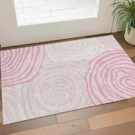 Pink Gray And Ivory Abstract Washable Area Rug With UV Protection Photo 1