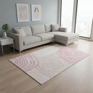 Photo of Pink Gray And Ivory Abstract Washable Area Rug With UV Protection