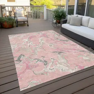 Photo of Pink Gray And Ivory Abstract Washable Indoor Outdoor Area Rug