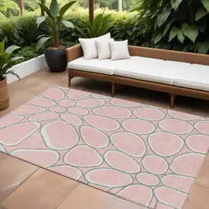 Photo of Pink Gray And Ivory Abstract Washable Indoor Outdoor Area Rug