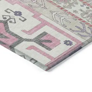Photo of Pink Gray And Ivory Aztec Washable Indoor Outdoor Area Rug