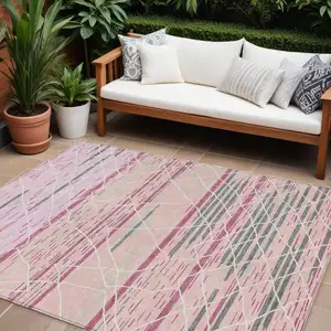 Photo of Pink Gray And Ivory Striped Washable Indoor Outdoor Area Rug