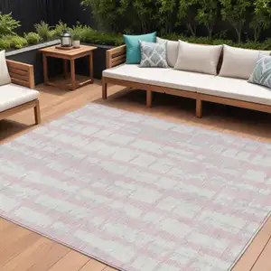 Photo of Pink Gray And Ivory Striped Washable Indoor Outdoor Area Rug