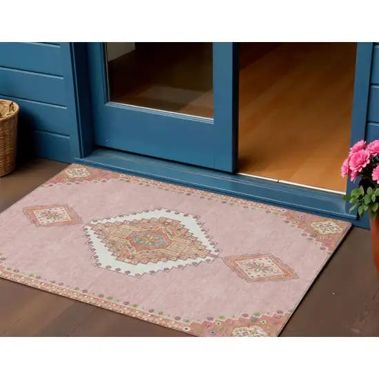 Pink Green And Ivory Oriental Washable Indoor Outdoor Area Rug Photo 1