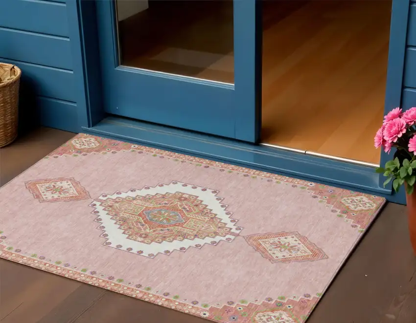 Pink Green And Ivory Oriental Washable Indoor Outdoor Area Rug Photo 1