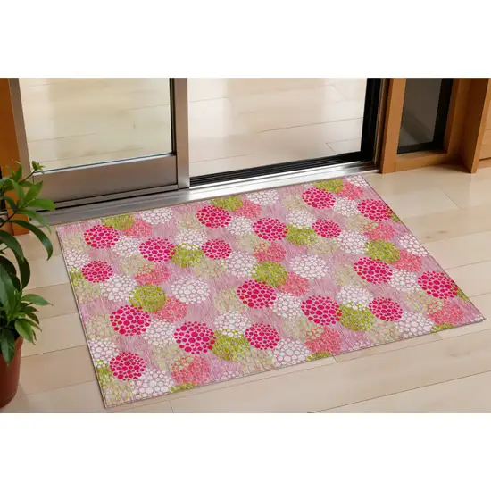 Pink Green And Ivory Polka Dot Washable Indoor Outdoor Area Rug Photo 1