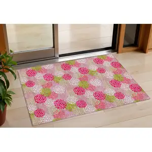 Photo of Pink Green And Ivory Polka Dot Washable Indoor Outdoor Area Rug