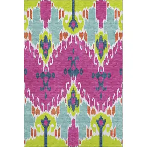 Photo of Pink Green And Teal Ikat Washable Area Rug With UV Protection
