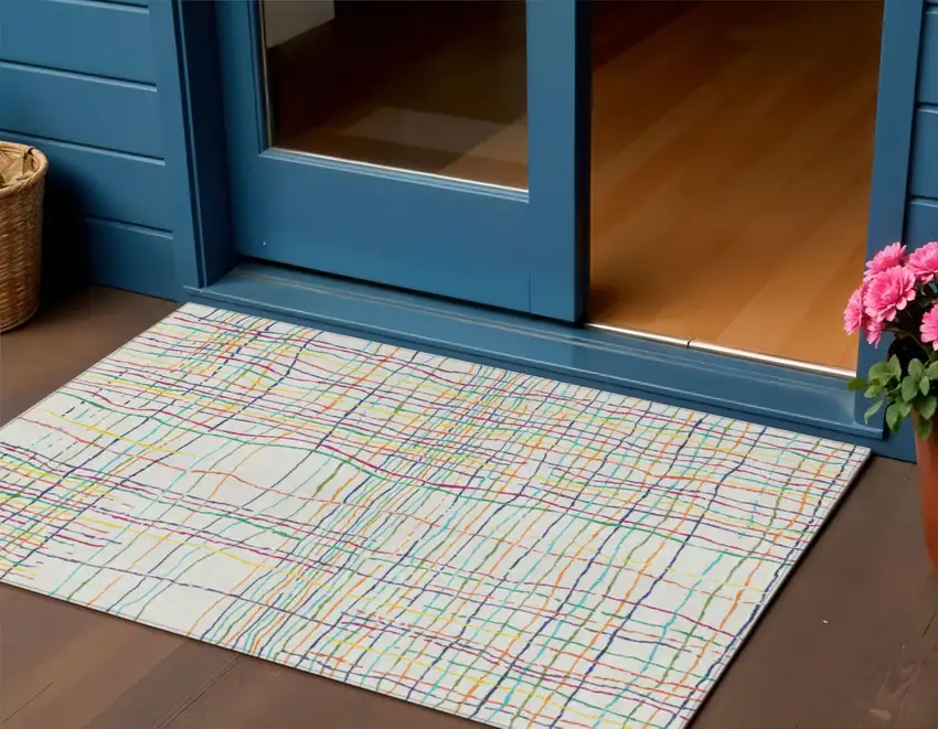 Pink Green And Yellow Striped Washable Indoor Outdoor Area Rug Photo 1