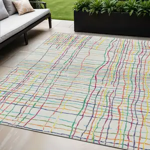 Photo of Pink Green And Yellow Striped Washable Indoor Outdoor Area Rug
