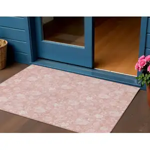 Photo of Pink Ivory And Blush Floral Washable Indoor Outdoor Area Rug
