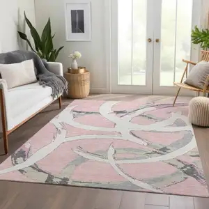 Photo of Pink Ivory And Gray Abstract Washable Area Rug With UV Protection