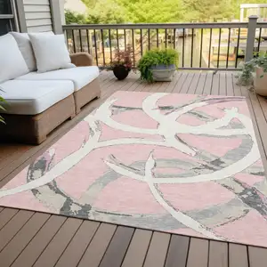 Photo of Pink Ivory And Gray Abstract Washable Indoor Outdoor Area Rug