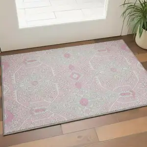 Photo of Pink Ivory And Gray Floral Washable Area Rug With UV Protection