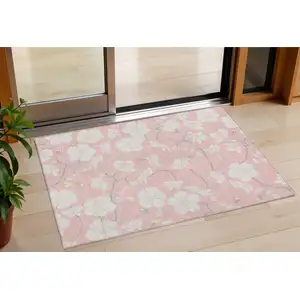 Photo of Pink Ivory And Gray Floral Washable Indoor Outdoor Area Rug